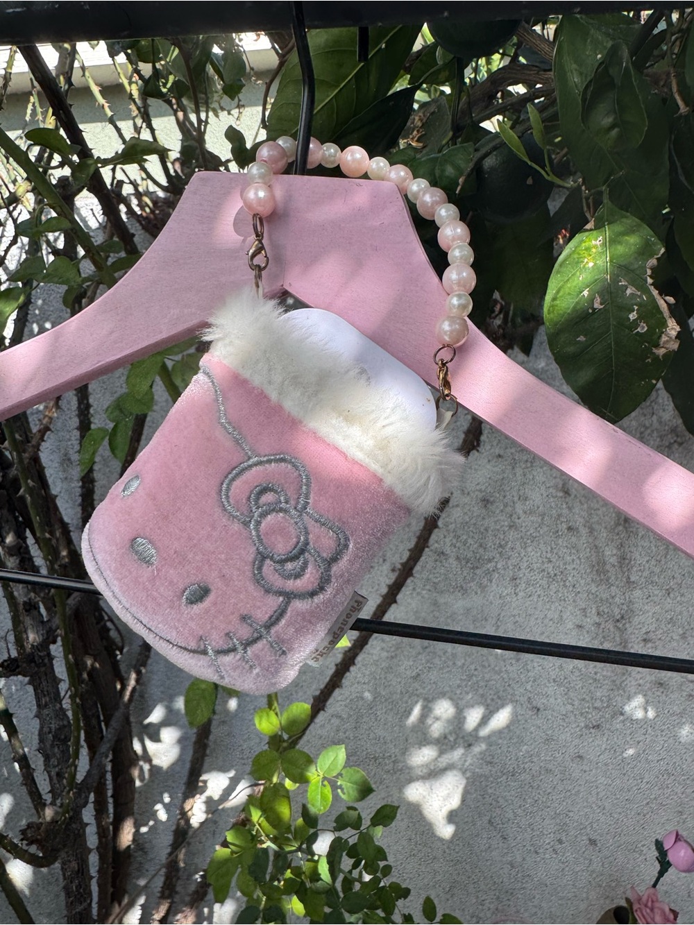 Hello kitty mini flip phone bag from the 90s